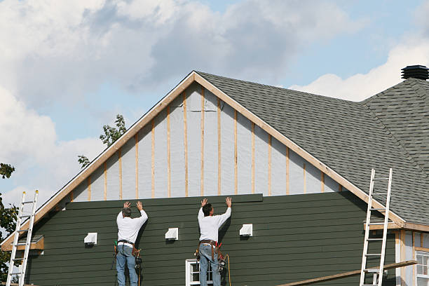 Professional Emergency Siding Repair technician working in Yadkinville, NC